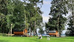 yoga-urlaub-deutschland-hotel-park-am-see-sauna Entspannen Sie in den gemütlichen Sauna-Wägen mit Blick auf den See
