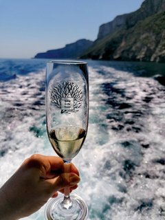 Die Sonne bei einem Glas Sekt genießen.