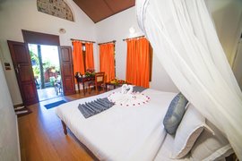 Vom Standard Room blicken Sie direkt in den grünen Garten