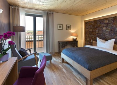 Das gemütliche Zimmer im Rosenberg Ayurveda Kurzentrum lädt zum Wohlfühlen ein