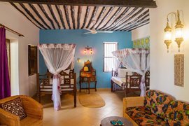 Die Cardamon Suite mit zwei Einzelbetten und ein Doppelbett