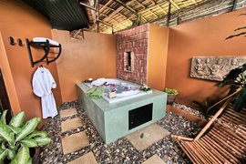 Das freiluft Badezimmer in der Deluxe Villa