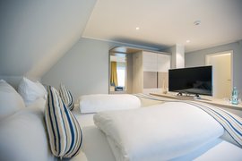 Die Zimmer der Nordsee Lodge sind gemütliche Wohlfühloasen