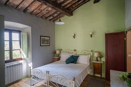 Ein Schlafzimmer in der Villa Junior Suite