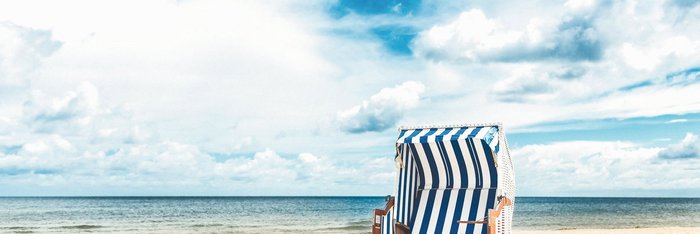 Genießen Sie die wohltuende Brise am langen Sandstrand von Baabe!