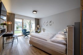 Doppelzimmer Pergola mit Blick auf den Garten