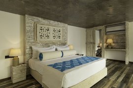 Entspannen Sie sich im großzügigen Bett des Garden Lofts