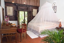 Wohnen Sie in den traditioniellen eingerichten Zimmer im Somatheeram Health