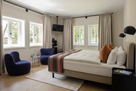 Doppelzimmer Deluxe mit großzügiger Sitzgruppe Doppelzimmer Deluxe mit großzügiger Sitzgruppe