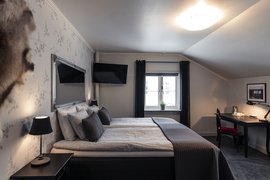 Das Deluxe Doppelzimmer ist stilvoll eingerichtet