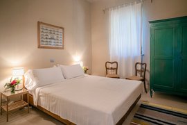 Ein Schlafzimmer der Villa Suite