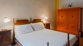 Ein Schlafzimmer in der Villa Junior Suite